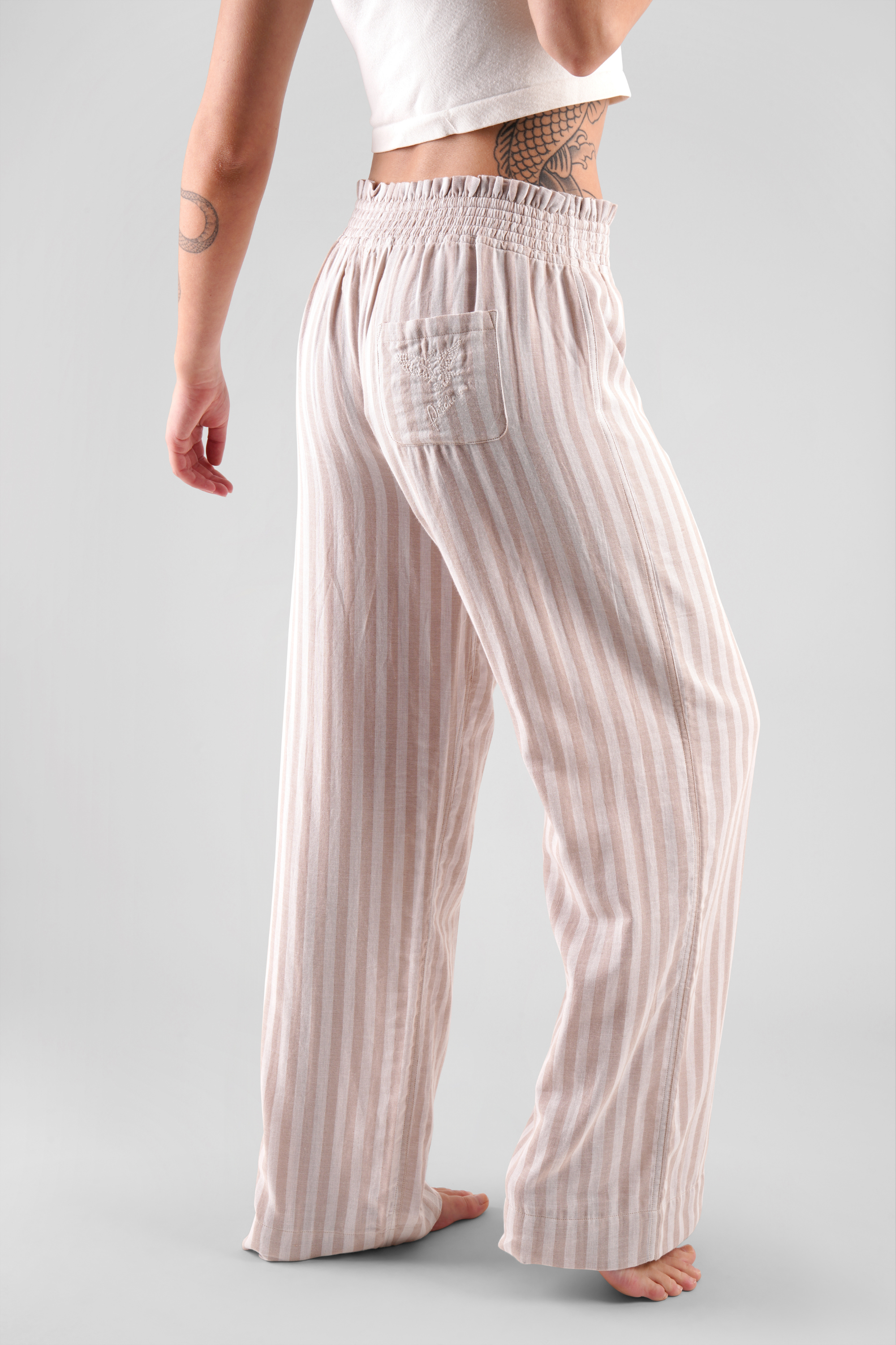 Chicory striped woven-cotton trousers - Golden Glow Beige